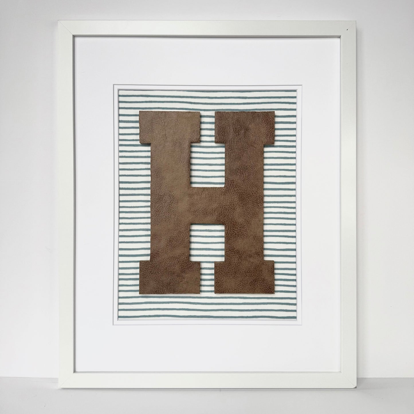 Framed Leather Initial on Light Blue Wavy Stripe, 18x22" Frame