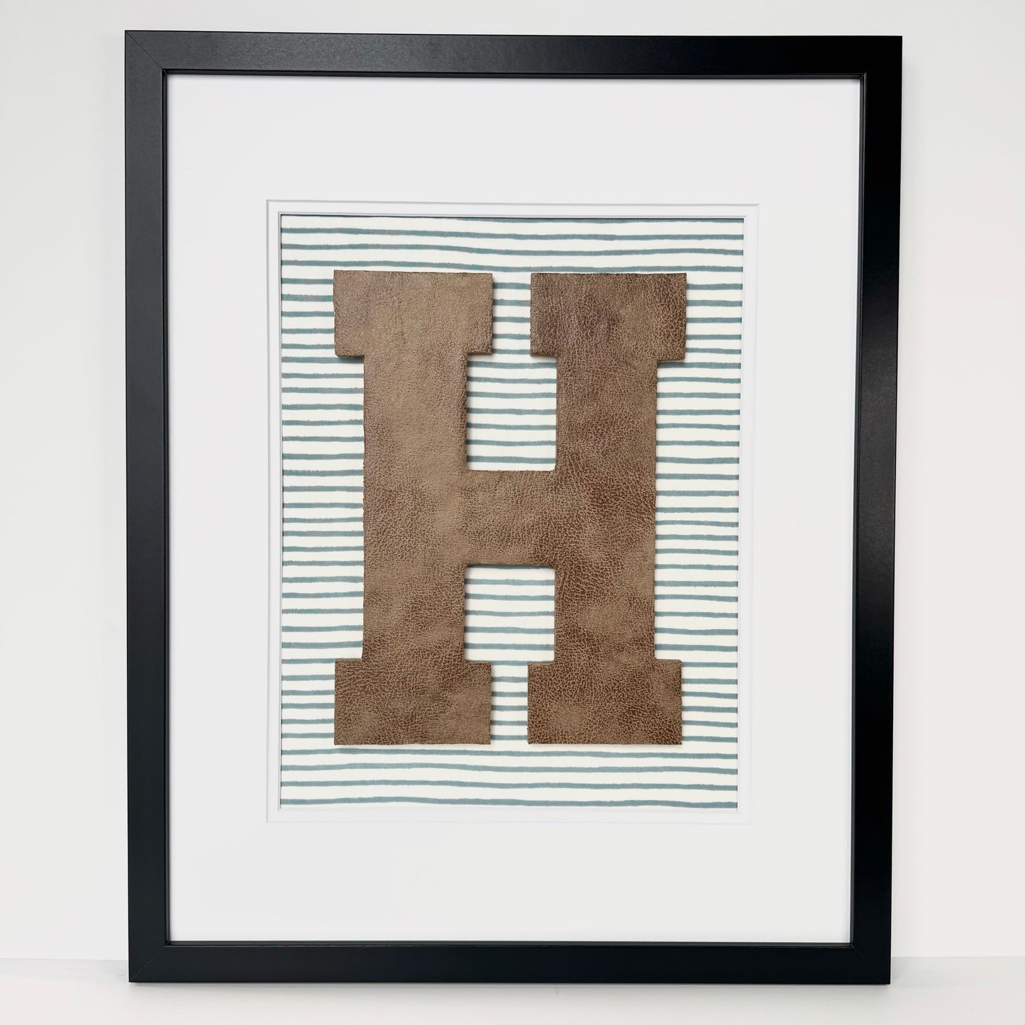 Framed Leather Initial on Light Blue Wavy Stripe, 18x22" Frame