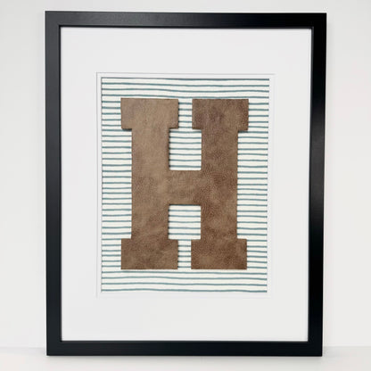 Framed Leather Initial on Light Blue Wavy Stripe, 18x22" Frame