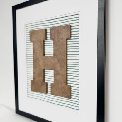 Framed Leather Initial on Light Blue Wavy Stripe, 18x22" Frame